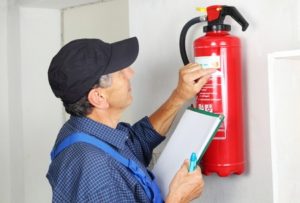 using a fire extinguisher